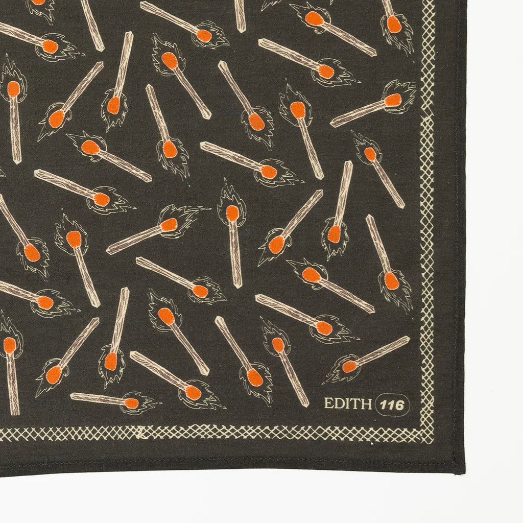 Handker bandana black cloth with little lit matches 